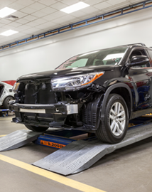 Toyota on vehicle lift | Moses Toyota in St. Albans WV